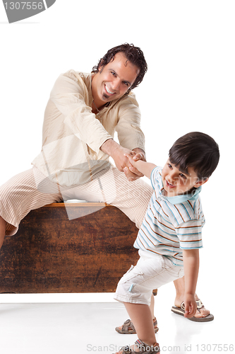 Image of Father and little son studio portrait