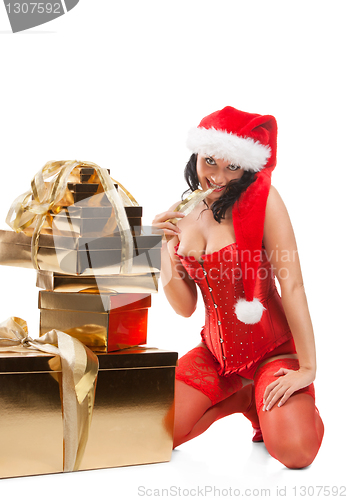 Image of Beautiful christmas woman in santa hat