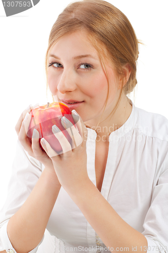 Image of Beautiful woman holding apple