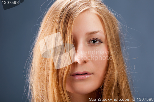 Image of Portrait of red-haired young woman