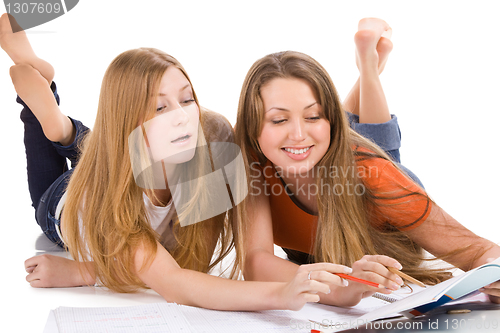 Image of two young happy student girl, isolated on white