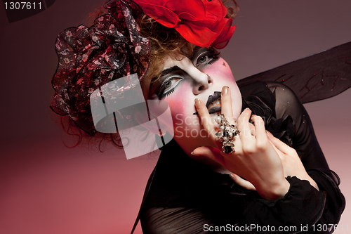 Image of woman mime with theatrical makeup