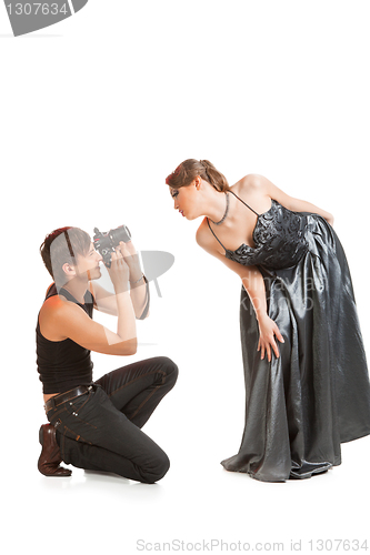 Image of Young adult female model and photographer.