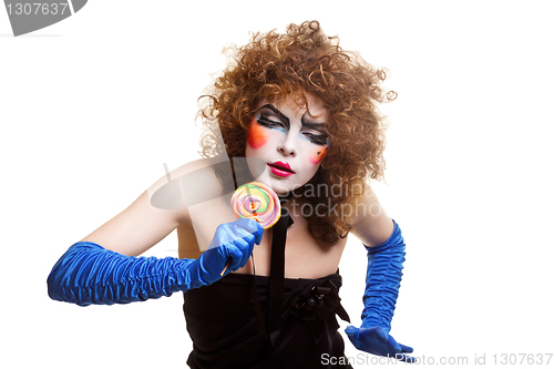 Image of woman mime with theatrical makeup singing