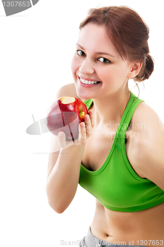 Image of woman in sportswear with apple