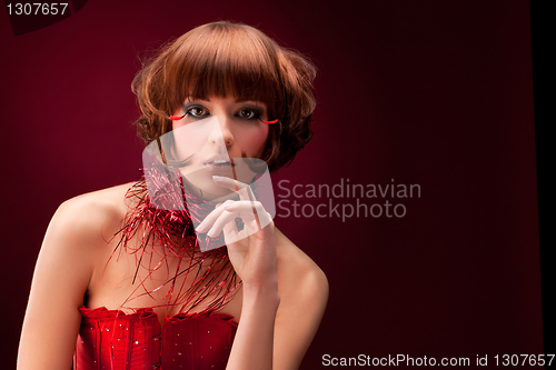 Image of Beautiful girl in red dress