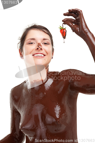 Image of woman covered sweet chocolate with strawberry