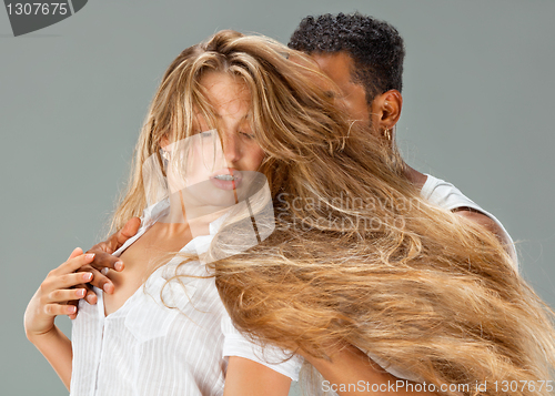 Image of Young couple dances Caribbean Salsa