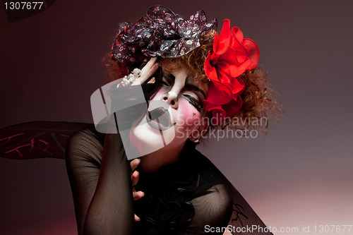 Image of woman mime with theatrical makeup