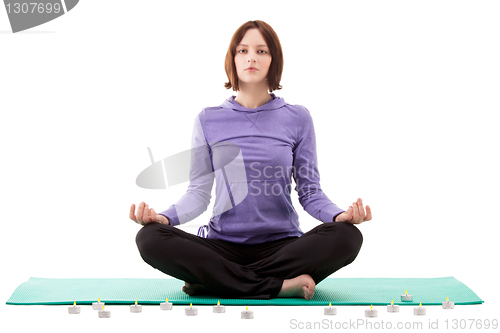 Image of Young woman practicing yoga