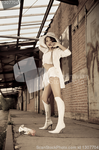 Image of beautiful young girl in white.