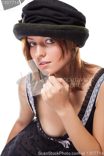 Image of pretty young woman with black bonnet