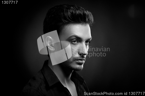 Image of Young man's portrait in back & wite