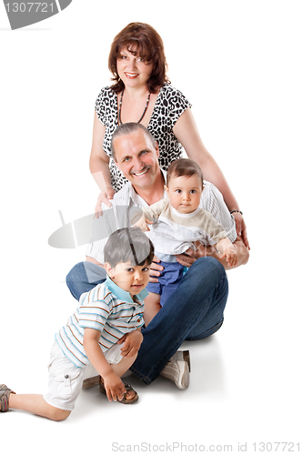 Image of Happy grandparents with two handsome grandsons