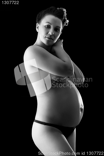 Image of Beautiful pregnant woman in back & wite