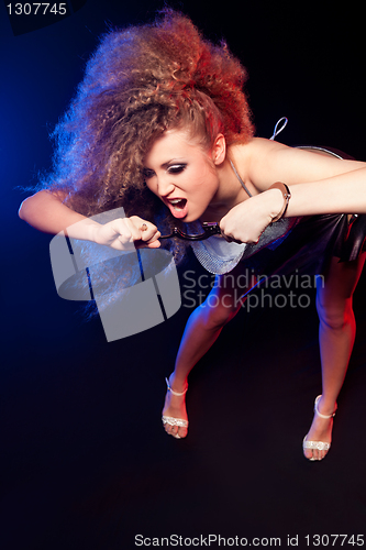 Image of Beautiful woman with handcuffs