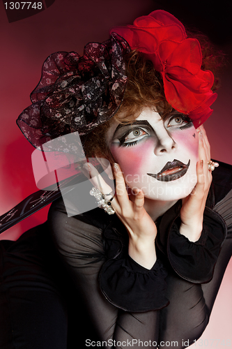 Image of woman mime with theatrical makeup