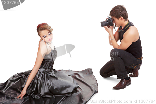 Image of Young adult female model and photographer.