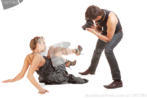 Image of Young adult female model and photographer.