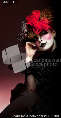 Image of woman mime with theatrical makeup