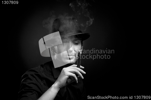 Image of Man with hat and cigar in Black & White