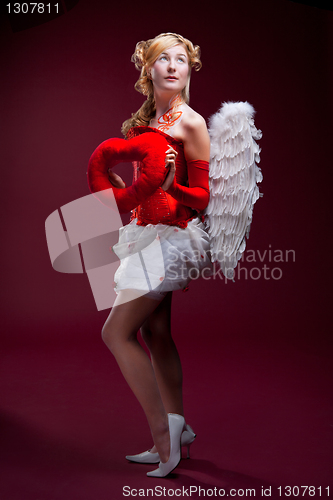 Image of Perfect blonde angel with a red heart