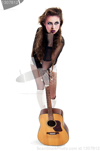 Image of rocker girl with acoustic guitar