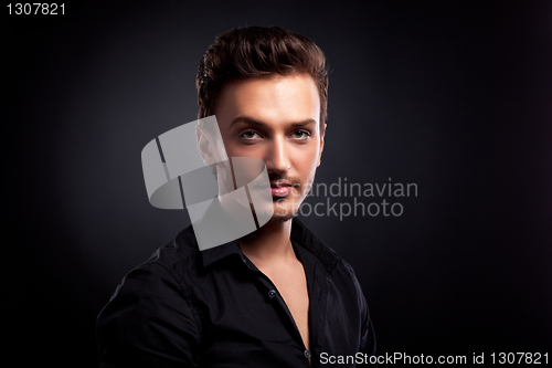 Image of Young man's portrait. Close-up face.