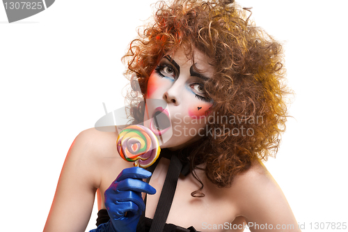 Image of woman mime with theatrical makeup singing