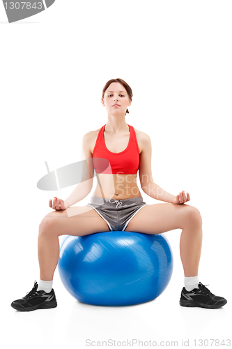 Image of woman exercising on an exercise ball