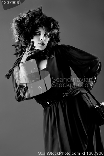 Image of Woman in old fashioned dress, in Black & White