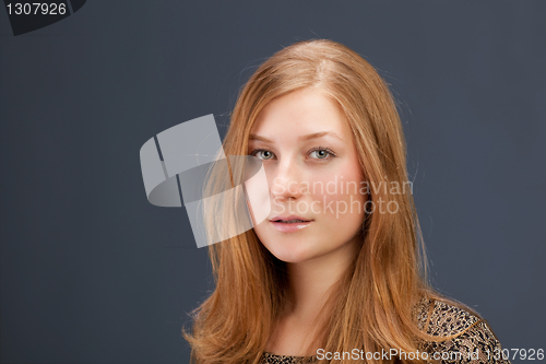 Image of Portrait of red-haired young woman