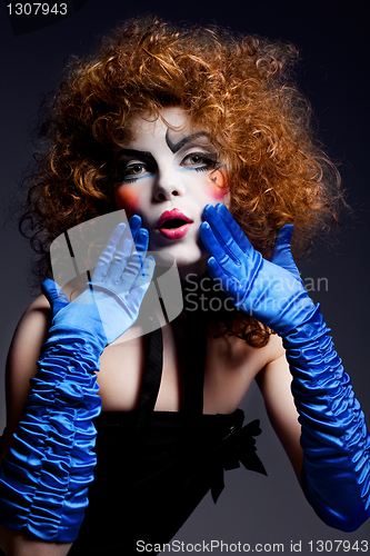 Image of woman mime with theatrical makeup