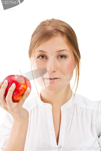 Image of Beautiful woman holding apple