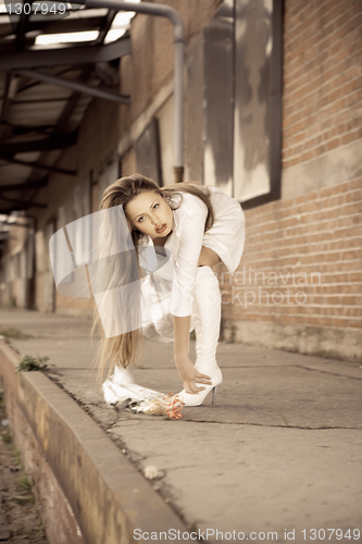 Image of beautiful young girl in white.