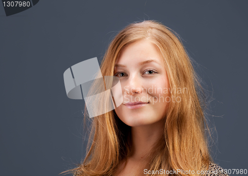 Image of Portrait of red-haired young woman