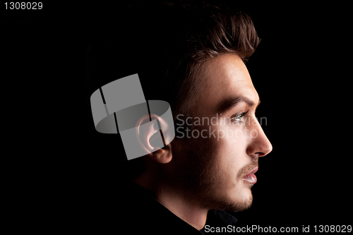 Image of Young man's portrait. Close-up face.