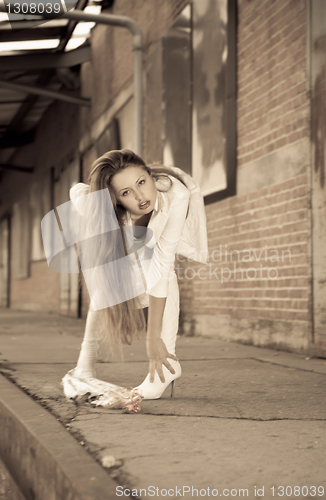 Image of beautiful young girl in white.