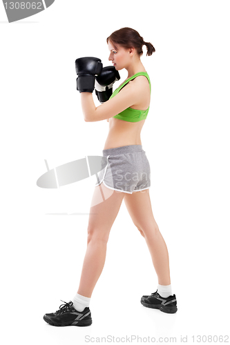 Image of young woman in boxing gloves