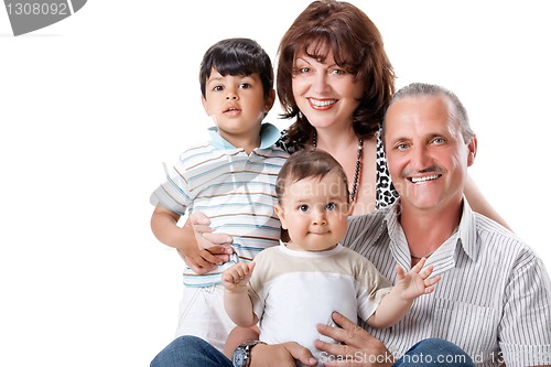 Image of Happy grandparents with two handsome grandsons