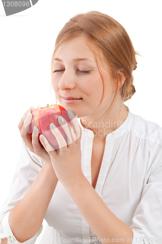 Image of Beautiful woman holding apple