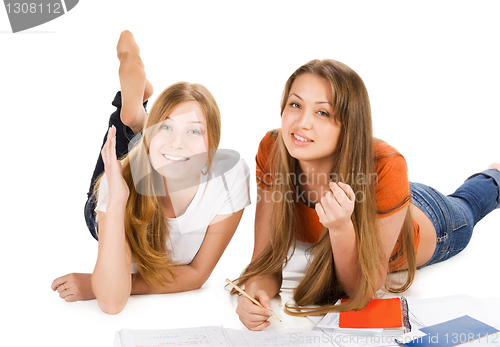 Image of two young happy student girl, isolated on white