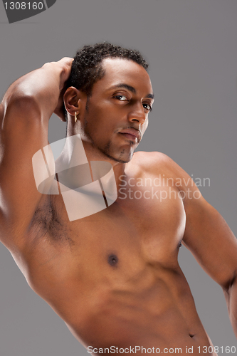 Image of Portrait of a naked muscular man