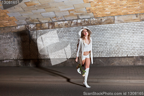 Image of fashion shot of a young woman