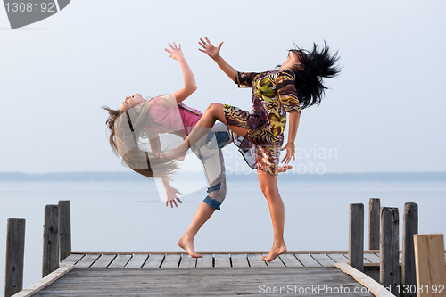 Image of two girl  are dancing