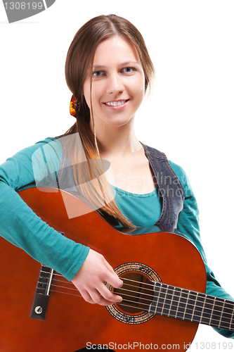 Image of cowgirl in ahat with acoustic guitar