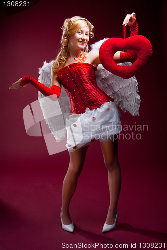 Image of Perfect blonde angel with a red heart