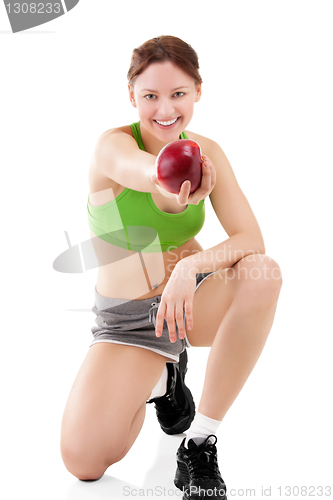 Image of woman in sportswear with apple