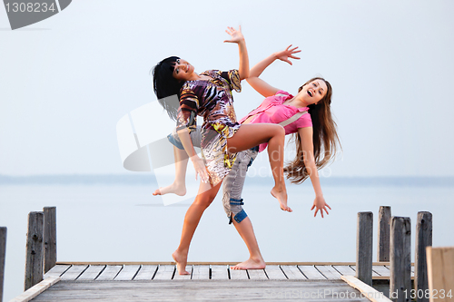 Image of two girl  are dancing