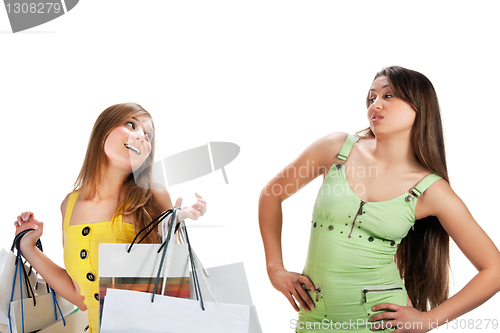 Image of Shopping. Two beautiful girl with bag
